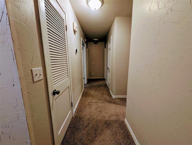 2436 NW 43rd Cir, Oklahoma City, OK 73112 - hallway with carpet flooring and baseboards