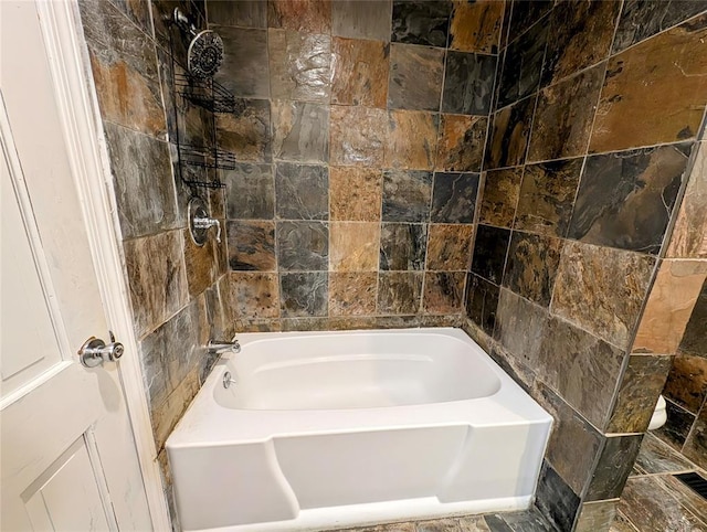 2436 NW 43rd Cir, Oklahoma City, OK 73112 - full bathroom featuring tile walls and bathtub / shower combination