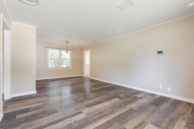 2204 Churchill Pl, Oklahoma City, OK 73120 - spare room featuring wood finished floors, a textured ceiling, and ornamental molding