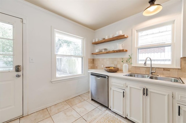 2204 Churchill Pl, Oklahoma City, OK 73120 - kitchen with dishwasher, healthy amount of natural light, decorative backsplash, white cabinetry, and ornamental molding
