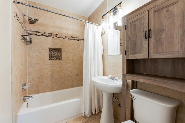 2204 Churchill Pl, Oklahoma City, OK 73120 - bathroom featuring shower / bath combo with shower curtain and tile patterned flooring