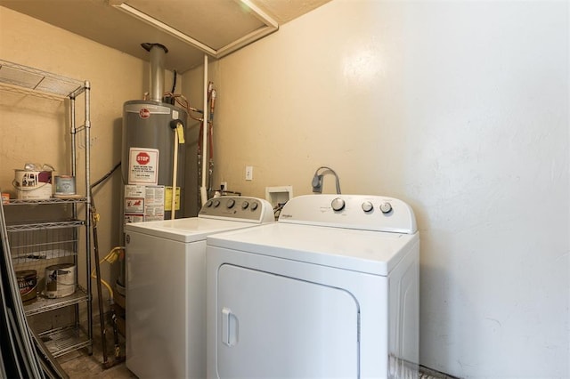 2204 Churchill Pl, Oklahoma City, OK 73120 - laundry room featuring washer and dryer and gas water heater