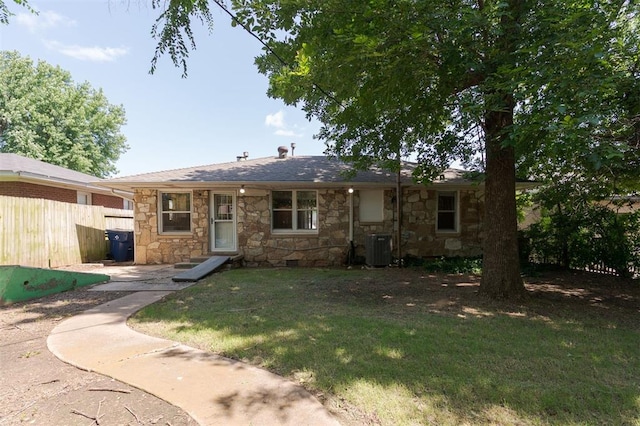 2204 Churchill Pl, Oklahoma City, OK 73120 - view of front of property with stone siding and a shingled roof