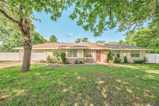 824 N Poplar Ln, Midwest City, OK 73130 - ranch-style home featuring an attached garage, concrete driveway, and stone siding