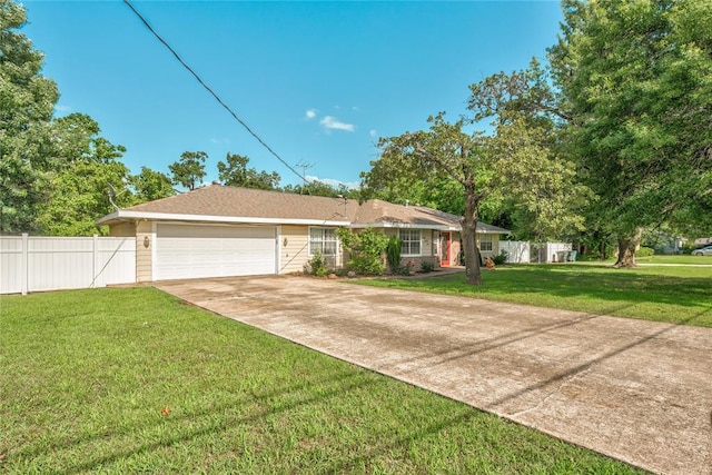 824 N Poplar Ln, Midwest City, OK 73130 - ranch-style house featuring an attached garage and concrete driveway