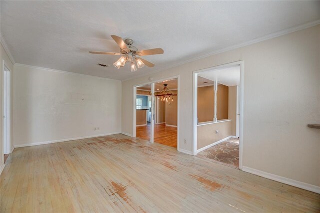 824 N Poplar Ln, Midwest City, OK 73130 - spare room with a chandelier, light wood-type flooring, a ceiling fan, and ornamental molding