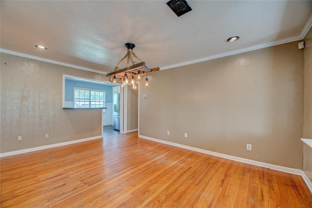 824 N Poplar Ln, Midwest City, OK 73130 - unfurnished room with light wood-style flooring, a chandelier, crown molding, and recessed lighting