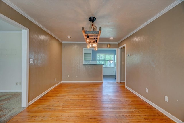824 N Poplar Ln, Midwest City, OK 73130 - spare room with light wood-style floors, a chandelier, recessed lighting, and ornamental molding