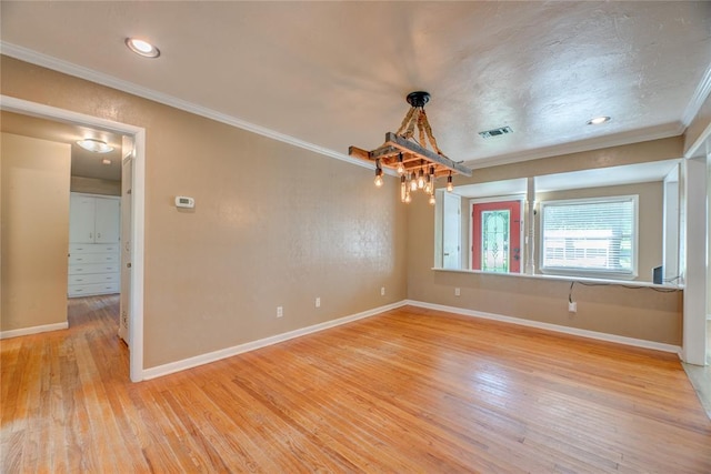 824 N Poplar Ln, Midwest City, OK 73130 - spare room featuring crown molding, wood finished floors, a chandelier, and recessed lighting