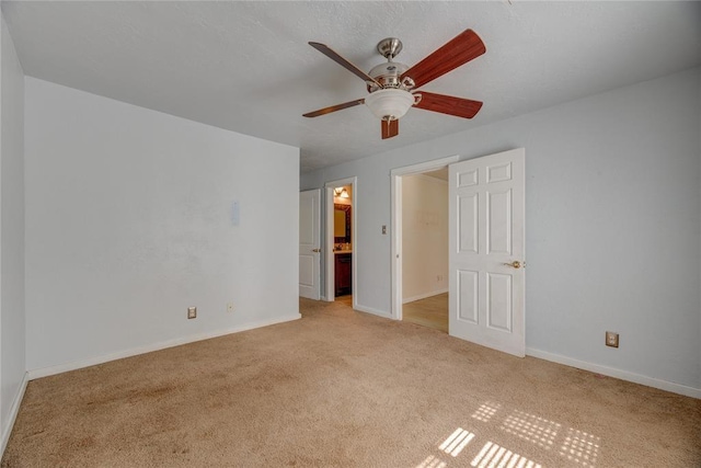 824 N Poplar Ln, Midwest City, OK 73130 - unfurnished bedroom with carpet flooring, ensuite bathroom, and a ceiling fan