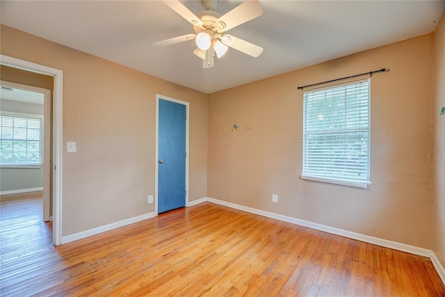 824 N Poplar Ln, Midwest City, OK 73130 - empty room featuring light wood-style floors and ceiling fan