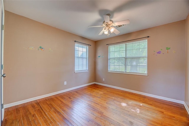 824 N Poplar Ln, Midwest City, OK 73130 - unfurnished room with light wood-type flooring and ceiling fan