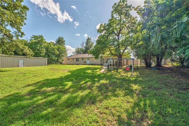 824 N Poplar Ln, Midwest City, OK 73130 - view of yard featuring a playground