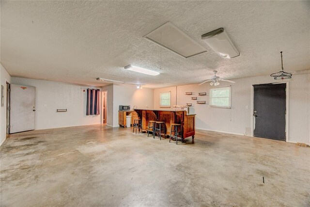 824 N Poplar Ln, Midwest City, OK 73130 - garage featuring a ceiling fan
