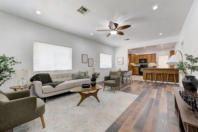 825 Elm Ave, Yukon, OK 73099 - living area featuring a ceiling fan, light wood-type flooring, and recessed lighting