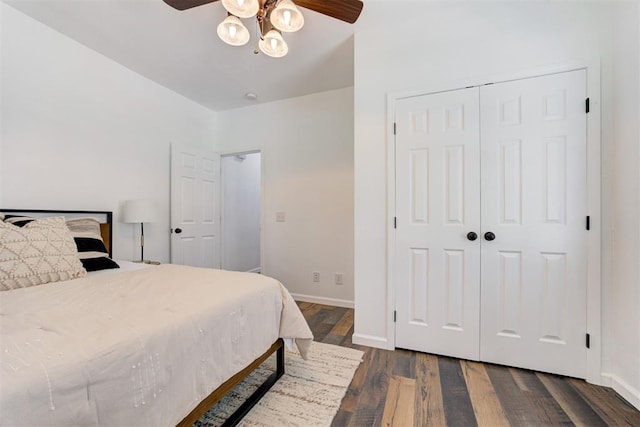 825 Elm Ave, Yukon, OK 73099 - bedroom with dark wood-style floors, a ceiling fan, and a closet