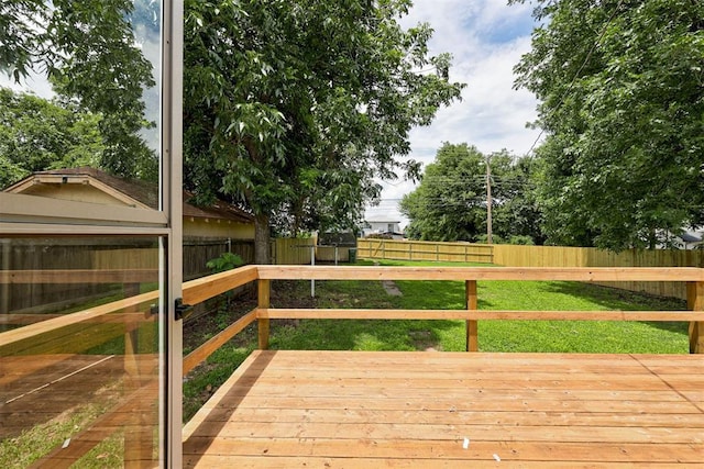 825 Elm Ave, Yukon, OK 73099 - wooden terrace with a fenced backyard