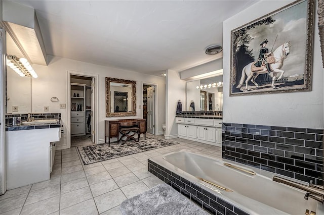 1504 Canary Pl, Edmond, OK 73034 - full bath featuring two vanities, tile patterned flooring, and tiled bath