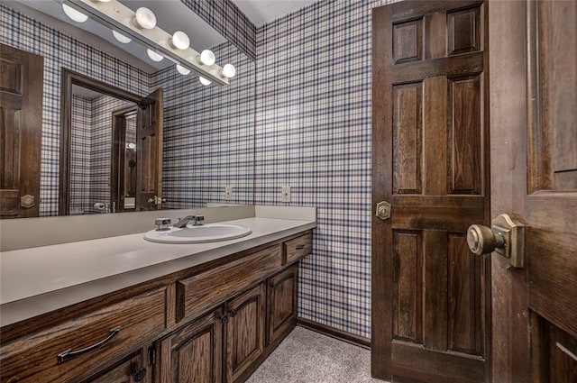 1504 Canary Pl, Edmond, OK 73034 - bathroom featuring wallpapered walls and vanity