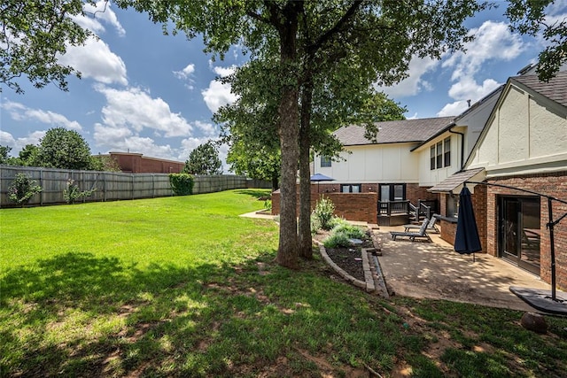 1504 Canary Pl, Edmond, OK 73034 - fenced backyard featuring a patio