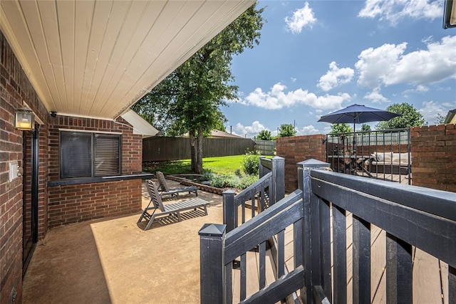 1504 Canary Pl, Edmond, OK 73034 - fenced backyard featuring a patio