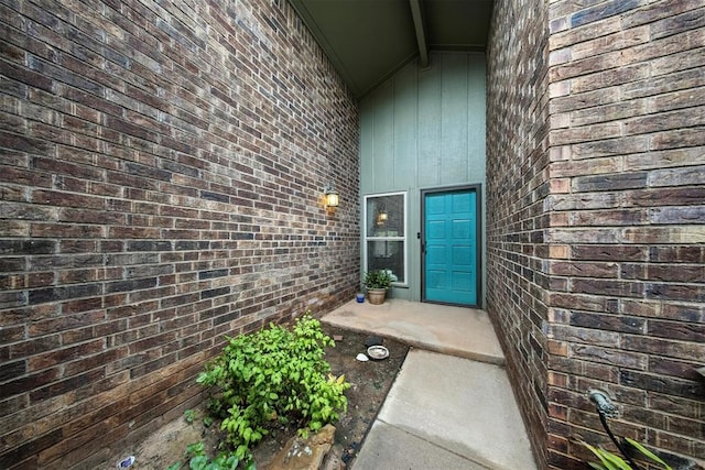 4713 N Cypress Ct, Oklahoma City, OK 73162 - view of exterior entry featuring brick siding