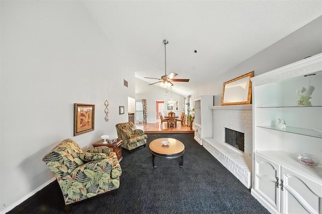 4713 N Cypress Ct, Oklahoma City, OK 73162 - carpeted living room featuring a ceiling fan, a brick fireplace, and high vaulted ceiling