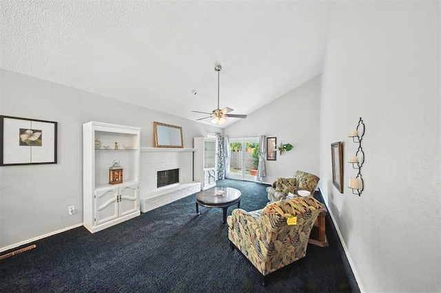 4713 N Cypress Ct, Oklahoma City, OK 73162 - carpeted living room with a brick fireplace, vaulted ceiling, and ceiling fan