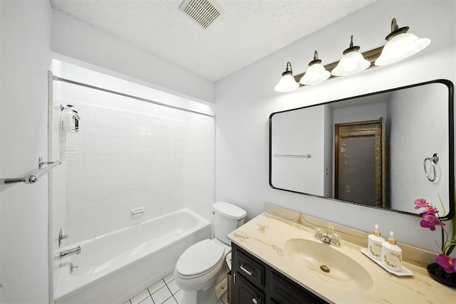 4713 N Cypress Ct, Oklahoma City, OK 73162 - bathroom featuring a textured ceiling, vanity, tub / shower combination, and tile patterned flooring