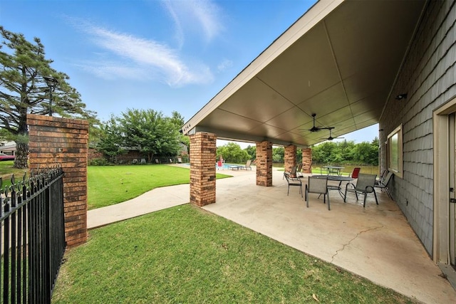4713 N Cypress Ct, Oklahoma City, OK 73162 - view of patio with a ceiling fan and outdoor dining space