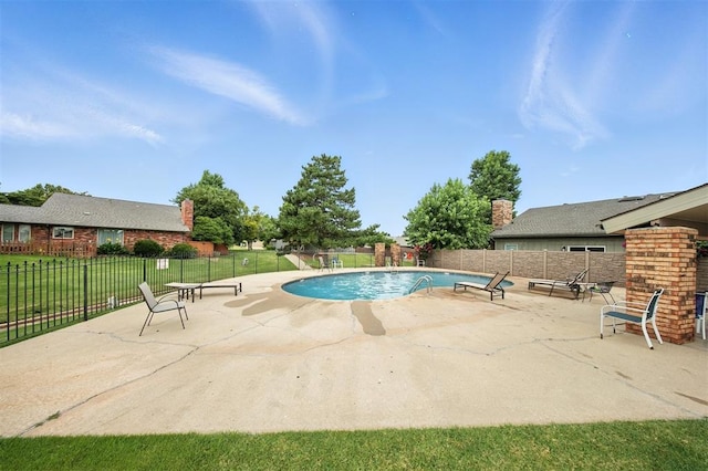 4713 N Cypress Ct, Oklahoma City, OK 73162 - view of swimming pool with a patio