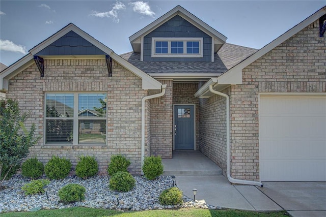 3800 Palmetto Trl, Oklahoma City, OK 73179 - view of front of house with a garage, brick siding, and a shingled roof