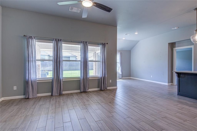 3800 Palmetto Trl, Oklahoma City, OK 73179 - unfurnished living room with ceiling fan, wood finished floors, vaulted ceiling, and recessed lighting