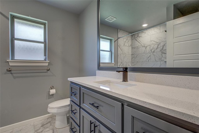 3800 Palmetto Trl, Oklahoma City, OK 73179 - bathroom with marble finish flooring, vanity, a tile shower, and recessed lighting