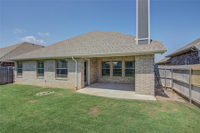 3800 Palmetto Trl, Oklahoma City, OK 73179 - rear view of house with a fenced backyard, brick siding, and a chimney