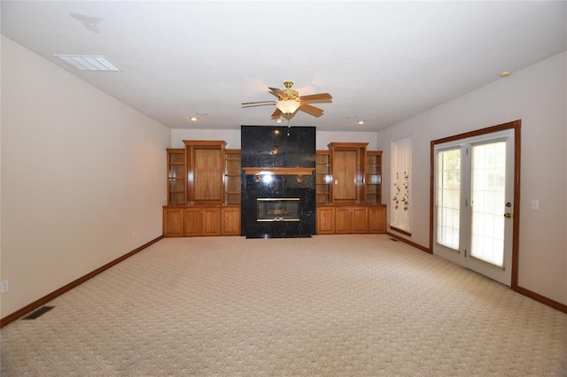 12608 Redstone Ct, Oklahoma City, OK 73142 - unfurnished living room featuring light carpet, a fireplace, and ceiling fan