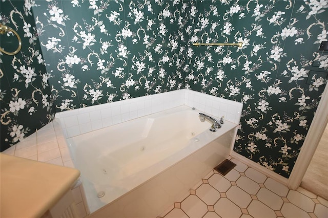 12608 Redstone Ct, Oklahoma City, OK 73142 - bathroom featuring a tub with jets and wallpapered walls