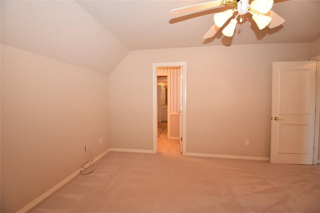 12608 Redstone Ct, Oklahoma City, OK 73142 - unfurnished bedroom featuring light colored carpet, lofted ceiling, and a ceiling fan