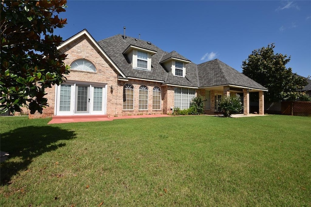 12608 Redstone Ct, Oklahoma City, OK 73142 - back of property featuring brick siding