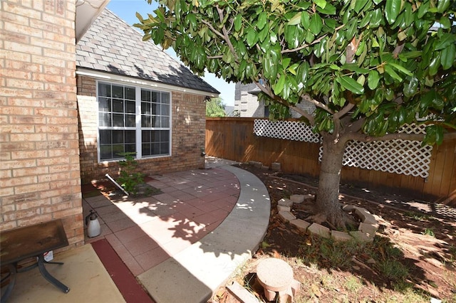 12608 Redstone Ct, Oklahoma City, OK 73142 - fenced backyard featuring a patio