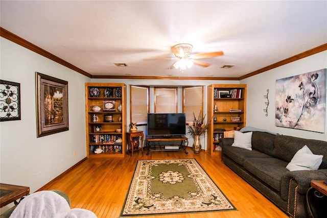23281 N Pvt 3227 Dr, Pauls Valley, OK 73075 - living room with a ceiling fan, wood finished floors, and crown molding