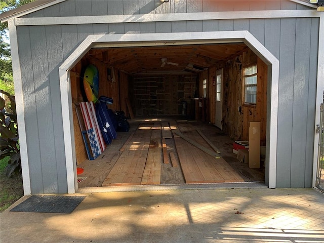 128 N Buffalo St, Canadian, OK 74425 - wooden deck featuring a garage