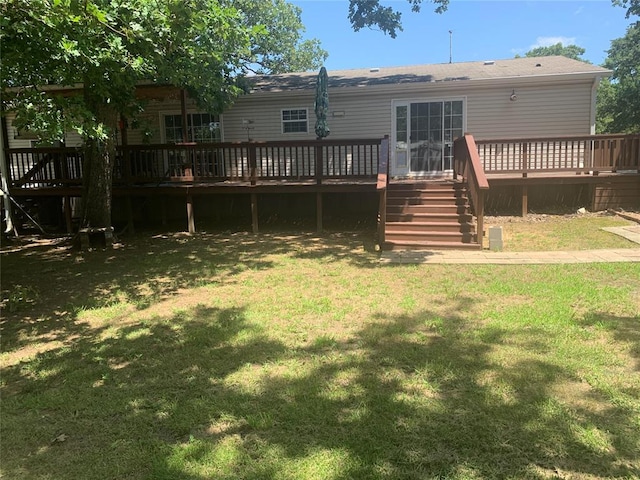 128 N Buffalo St, Canadian, OK 74425 - rear view of property with a lawn and a deck