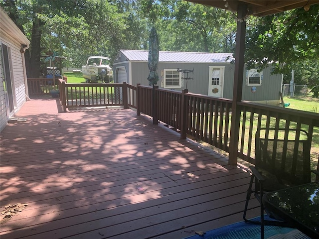 128 N Buffalo St, Canadian, OK 74425 - wooden deck featuring a yard