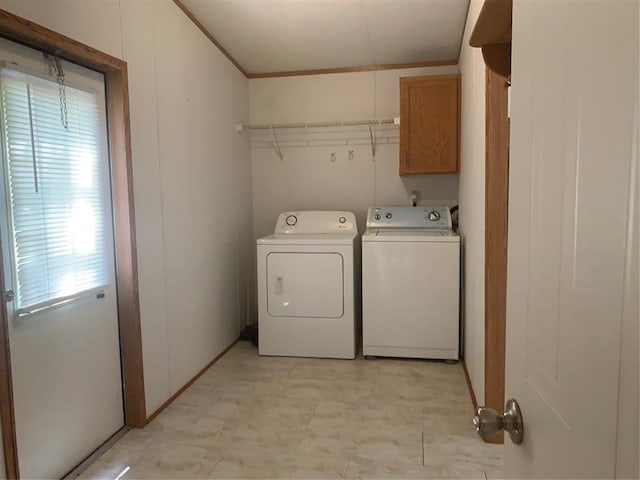 128 N Buffalo St, Canadian, OK 74425 - laundry room featuring washing machine and clothes dryer, cabinet space, plenty of natural light, crown molding, and light flooring