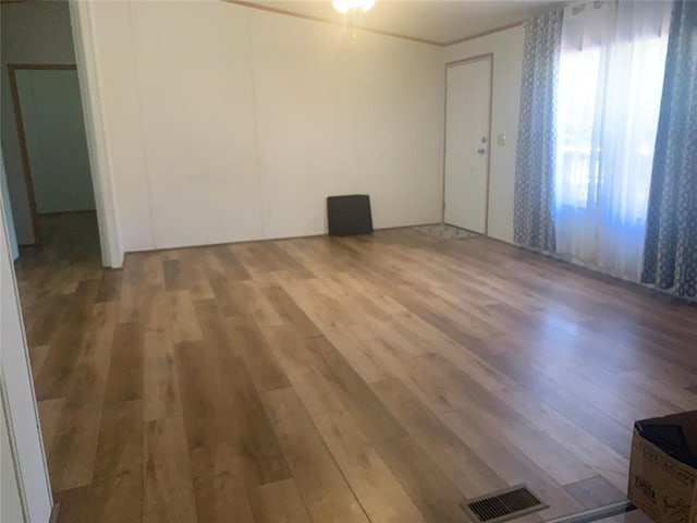 128 N Buffalo St, Canadian, OK 74425 - empty room featuring wood finished floors