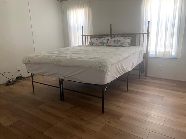 128 N Buffalo St, Canadian, OK 74425 - bedroom featuring hardwood / wood-style floors