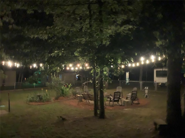 128 N Buffalo St, Canadian, OK 74425 - view of yard at night