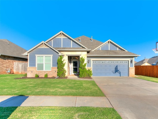 1417 Atalon Dr, Moore, OK 73160 - view of front of home featuring brick siding, concrete driveway, a garage, and roof with shingles