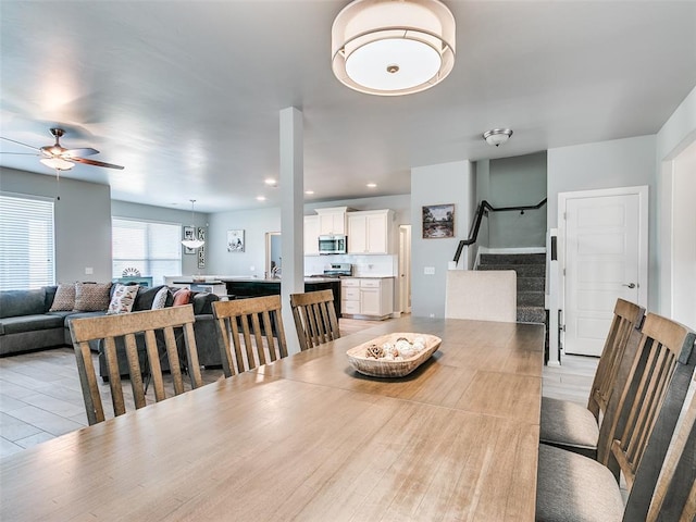 1417 Atalon Dr, Moore, OK 73160 - dining area with ceiling fan and stairs
